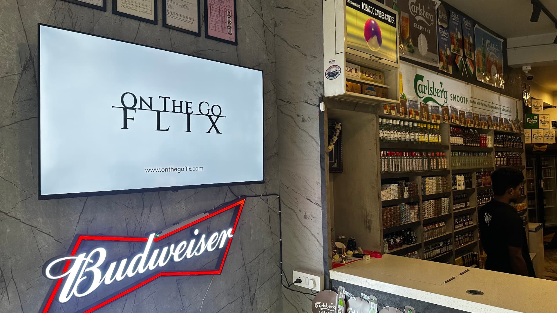 An installed screen inside A R Liquors